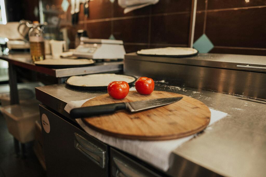 Chopped Tomatoes and cooking in Ghana