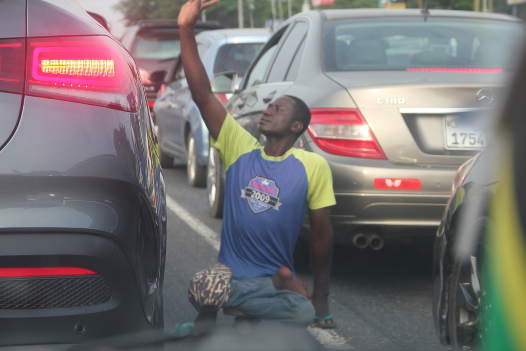 Disabled begging, The rich and the poor. Ghana 2026, Accra